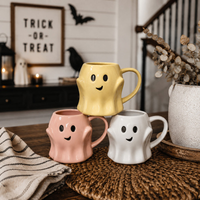 Pastel ghost mugs with Halloween decor