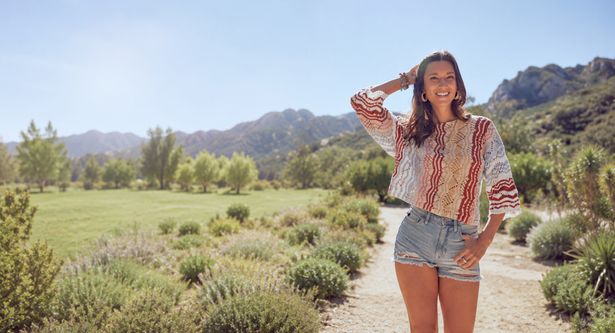 Woman on desert mountain landscape