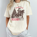 XL Ivory North Pole Rodeo Comfort Colors Tee, Holliday Graphic Tee, Santa, Horse, Cowoboy Shirt 