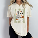 Medium Ivory Skeleton Witch Halloween Graphic Tee, Boom Stick Shirt, Halloween Stripes Comfort Colors Tee
