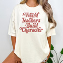 Small Ivory Weird Teachers Build Character Graphic Tee, Funny Teacher Shirt, Back to School Tee, First Day of School