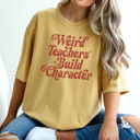 Large Mustard Weird Teachers Build Character Graphic Tee, Funny Teacher Shirt, Back to School Tee, First Day of School