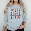 Small Athletic Heather XOXO Tic Tac Toe Graphic Sweatshirt, Valentine Graphic Sweatshirt, XOXO Shirt, Cute Valentine's Day Sweatshirt, Glitter Heart Sweatshirt