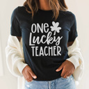 Medium Black One Lucky Teacher Graphic Tee, St. Patricks Day Shirt, Teacher Saint Patrick Shirt, Teacher Graphic Tee, Cute St. Patty Shirt