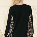 Large BLACK SOLID TUNIC TOP WITH ANIMAL SIDE CONTRAST
