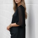 Large BLACK SOLID SHORT SLEEVE TOP WITH SWISS DOT SLEEVES 