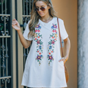  Embroidered dress with pockets