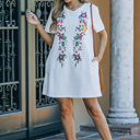  Embroidered dress with pockets