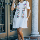  Embroidered dress with pockets
