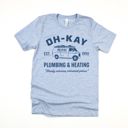  Oh-Kay Heating and Plumbing 1990s Christmas Movie Nostalgia - T-Shirt (Crewneck)  100 Cotton Solid Colors Jersey Tee (Unisex)  Bella Canvas, T-Shirt (Crewne