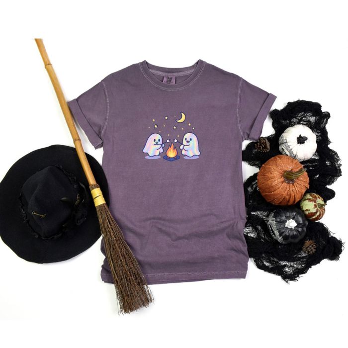Faux (Printed, not real fabric / iridescence)   Irredescant Cute Spooky Halloween Ghosts Making Smores Around A Campfire - T-Shirt (Crewneck)  100 Cotton Heavyweight Tee (Unisex)  Comfort Colors
