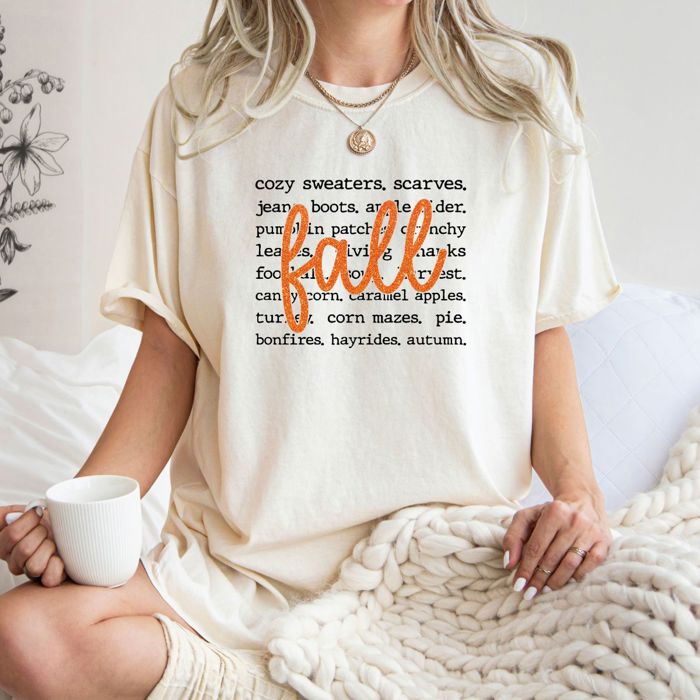 Faux (Printed, not real sparkles or fabric)  Sparkly Fall With Autumn Words in Background - T-Shirt (Crewneck)  100 Cotton Heavyweight Tee (Unisex)  Comfort Colors