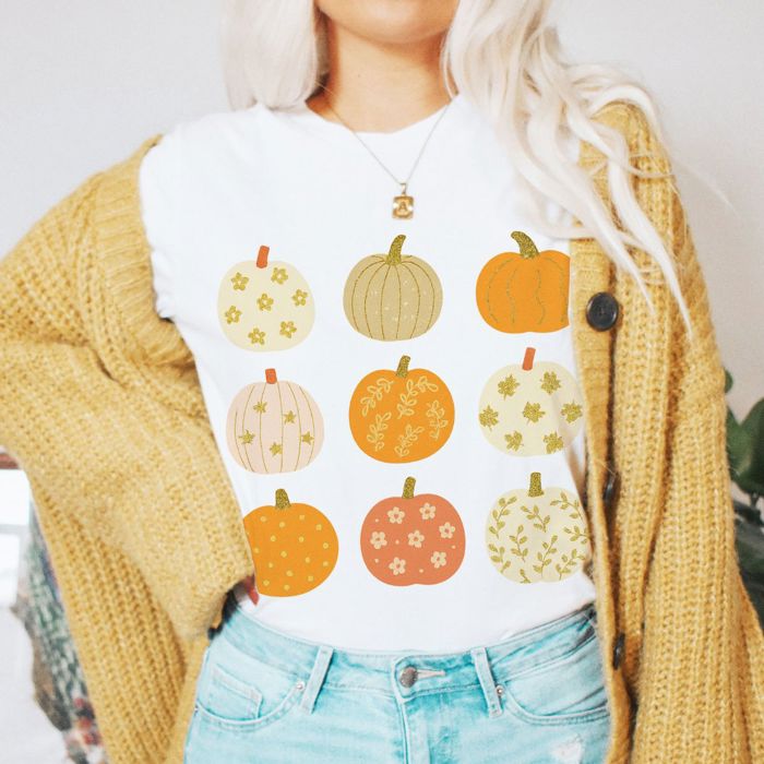 Faux (Printed, not real glitter or fabric)     Glitter Pumpkins In A Grid For Fall - T-Shirt (Crewneck)  100 Cotton Solid Colors Jersey Tee (Unisex)  Bella Canvas