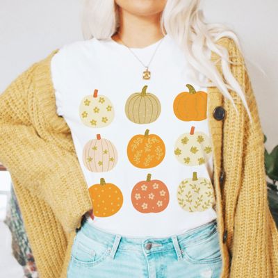 Faux (Printed, not real glitter or fabric)     Glitter Pumpkins In A Grid For Fall - T-Shirt (Crewneck)  100 Cotton Solid Colors Jersey Tee (Unisex)  Bella Canvas
