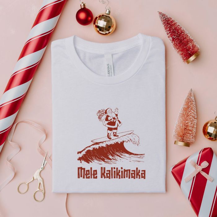 MeleKalikimaka Hawaiin Holiday Surfing Santa Claus - Soft Longer Length Bella Canvas Tee