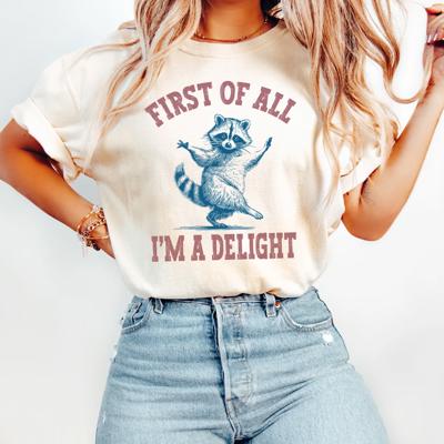 First of All, Im A Delight Funny Adorable Raccoon - T-Shirt (Crewneck)  100 Cotton Heavyweight Tee (Unisex) Comfort Colors
