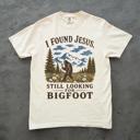  I Found Jesus, Still Looking For Bigfoot - Funny Christian Outdoorsy - T-Shirt Options (Main Image - Comfort Colors - Ivory)