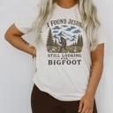  I Found Jesus, Still Looking For Bigfoot - Funny Christian Outdoorsy - T-Shirt Options (Main Image - Comfort Colors - Ivory)