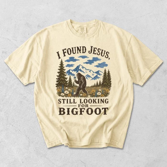 I Found Jesus, Still Looking For Bigfoot - Funny Christian Outdoorsy - T-Shirt Options (Main Image - Comfort Colors - Ivory)