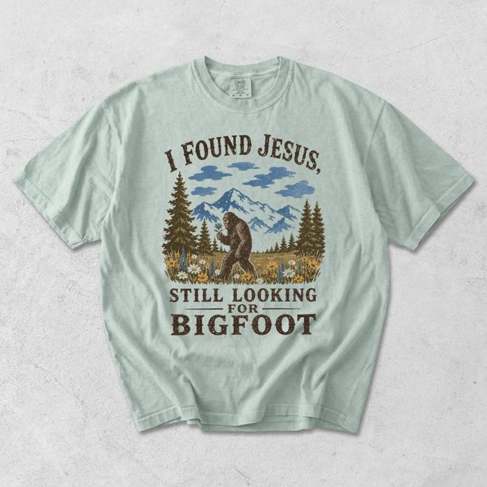 I Found Jesus, Still Looking For Bigfoot - Funny Christian Outdoorsy - T-Shirt Options (Main Image - Comfort Colors - Ivory)