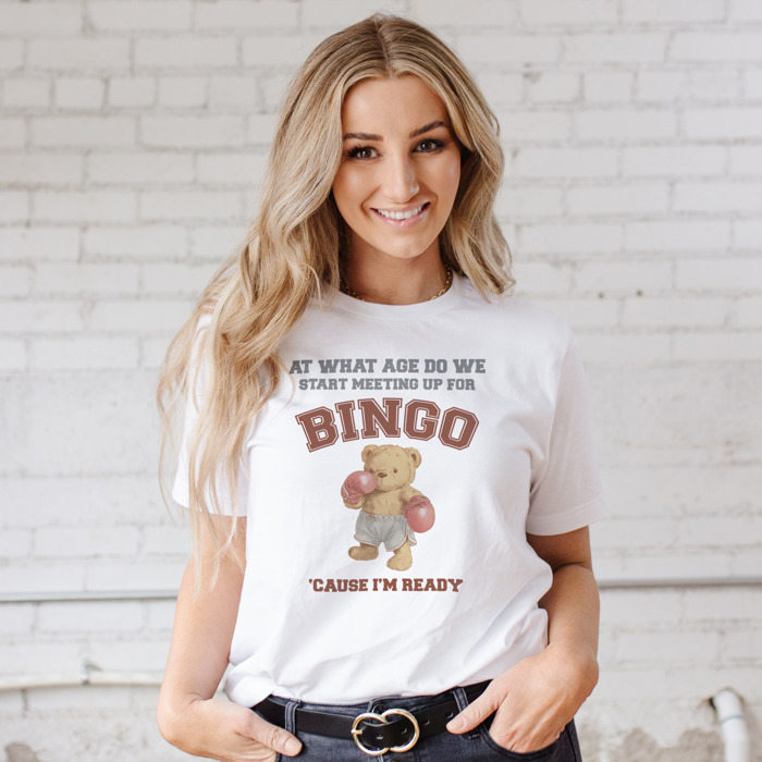 At What Age Do We Start Meeting Up For Bingo 'Cause I'm Ready Boxing Bear Funny Viral Meme Shirt Retro Bingo Champion Bear Soft Cozy Longer Length Unisex Graphic Tee T-shirt
