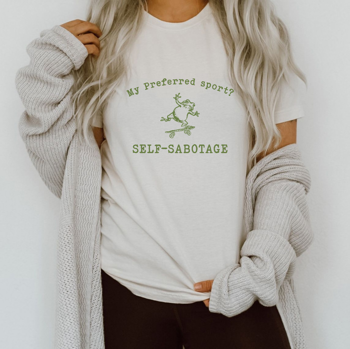 Skate or Self-Sabotage: The Frog That Defies Expectations Soft Cozy Longer Length Unisex Graphic Tee T-shirt