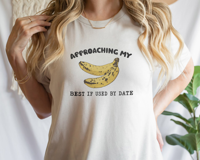 APPROACHING MY BEST IF USED BY DATE | Banana Countdown: Embrace the Ripe Journey Soft Cozy Longer Length Unisex Graphic Tee T-shirt
