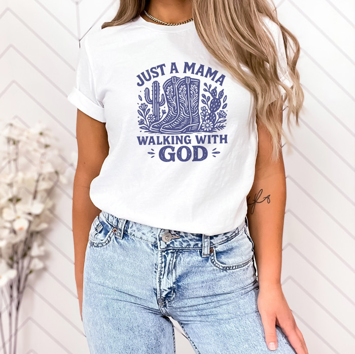 JUST A MAMA WALKING WITH GOD | Boots, Faith, and the Journey of Motherhood Soft Cozy Longer Length Unisex Graphic Tee T-shirt