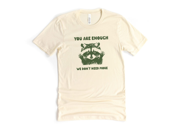 DO MORE OF WHAT YOU LOVE | Unleash the Joy: A Dinosaur's Delight Soft Cozy Longer Length Unisex Graphic Tee T-shirt