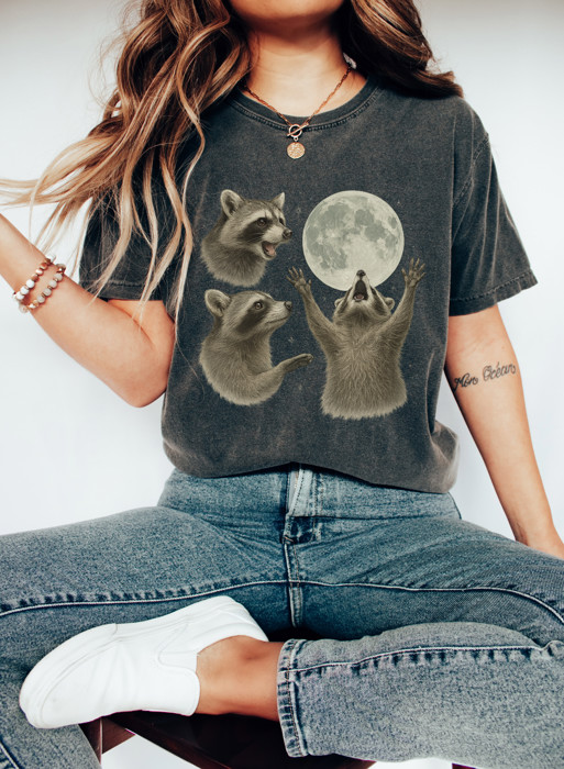 Raccoon Moonlight | Howling to the Moon: A Raccoon's Cosmic Serenade Unisex Heavyweight Comfort Tee