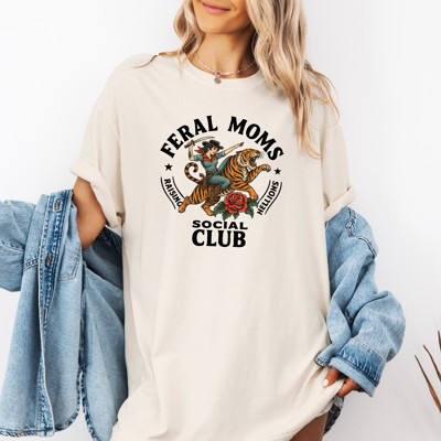 FERAL MOMS | RAISING HELLIONS | SOCIAL CLUB | Wild Women Unite: A Celebration of Fierce Femininity Unisex Heavyweight Comfort Tee