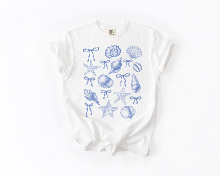 Shells and Starfish with Ribbons | Coastal Elegance: A Nautical Delight Unisex Heavyweight Comfort Tee