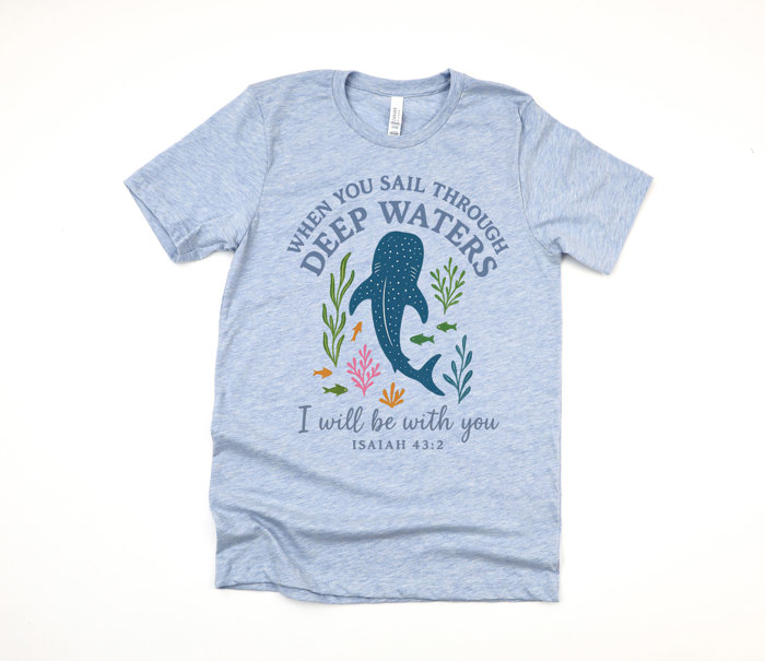 WHEN YOU SAIL THROUGH DEEP WATERS | Guiding Light in Troubled Seas Soft Cozy Longer Length Unisex Graphic Tee T-shirt