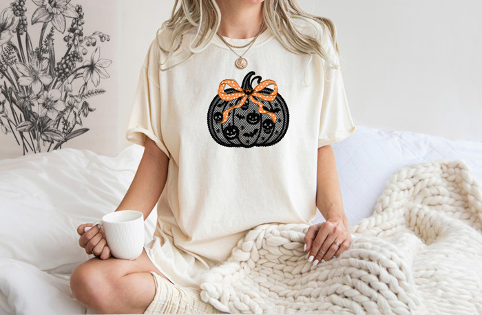 Faux (Printed, not real lace)  Black Lace Halloween Pumpkin With Bow For Fall - T-Shirt (Crewneck)  100 Cotton Heavyweight Tee (Unisex)  Comfort Colors