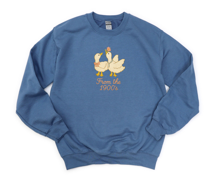 From The 1900s Faux (Printed, not real fabric or cross stitch)  Cross Stitch Cute 1980s Style Goose - Drop Shoulder Comfy Sweatshirt