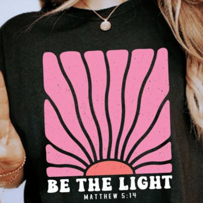 Be the Light Christian Graphic Tee Matthew 5:14 Bible Verse Inspirational Black T-Shirt