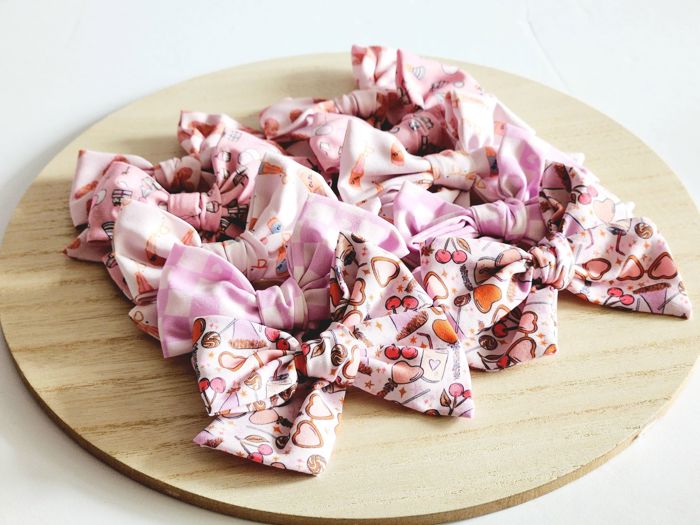 SET OF TWO kids Hand Tied Piggie Bows