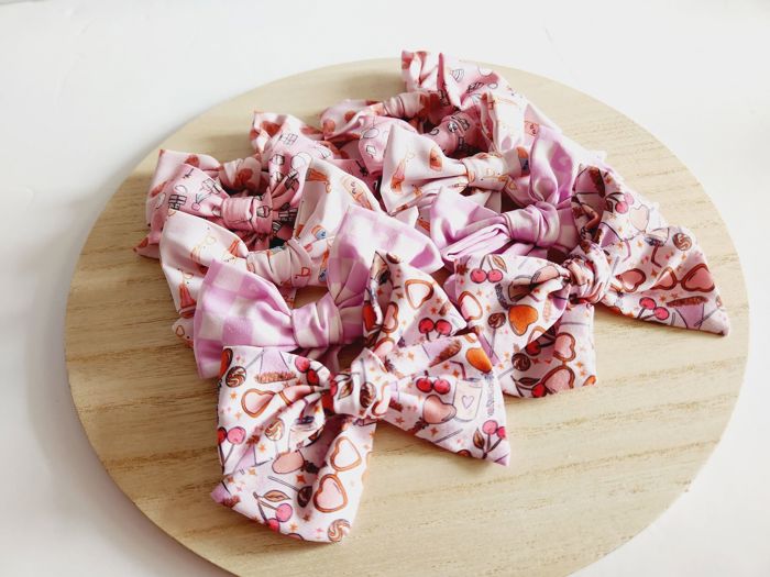 SET OF TWO kids Hand Tied Piggie Bows