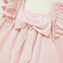  Blush Bow Back Ruffle Mini Dress