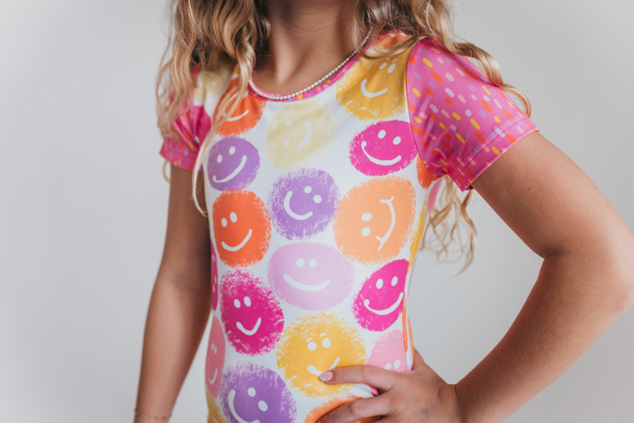 Kids Bright Smiley Bow Shortie Dance Tumble Leotard