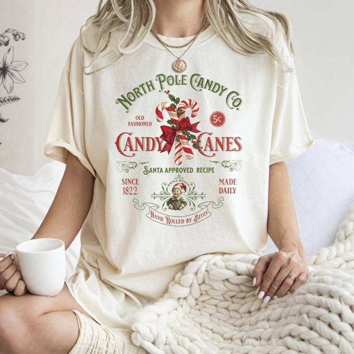 North Pole Candy Company Christmas Retro Sign Nostalgic Holiday Storefront Display Comfort Colors Tee