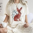 Medium Ivory Cream Rabbit Folk Art Inspired Scandinavian Winter Christmas Scene Art Comfort Colors Tee