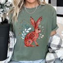 Small Moss Dark Green Rabbit Folk Art Inspired Scandinavian Winter Christmas Scene Art Comfort Colors Tee