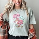 Medium Bay Light Sage Ho Ho Ho Pink Skateboarding Santa Retro Christmas Graphic Holiday Edition Comfort Colors Tee