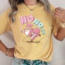 Large Mustard Ho Ho Ho Pink Skateboarding Santa Retro Christmas Graphic Holiday Edition Comfort Colors Tee