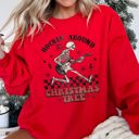 Medium Red Rocking Around The Christmas Tree Skeleton Rock Holiday Ornament Edition Sweatshirt