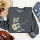 Small Dark Gray Heather Raccoon Playing A Guitar In A Whimsical Forest Scene With Playful Vibe Sweatshirt
