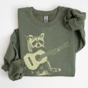 Small Military Green Raccoon Playing A Guitar In A Whimsical Forest Scene With Playful Vibe Sweatshirt