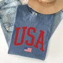 Medium Blue Jean USA Flag Patriotic American Pride Print Emblem With Bold Stars And Stripes Across The Banner Comfort Colors Tee