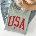 XXL Bay Light Sage USA Flag Patriotic American Pride Print Emblem With Bold Stars And Stripes Across The Banner Comfort Colors Tee